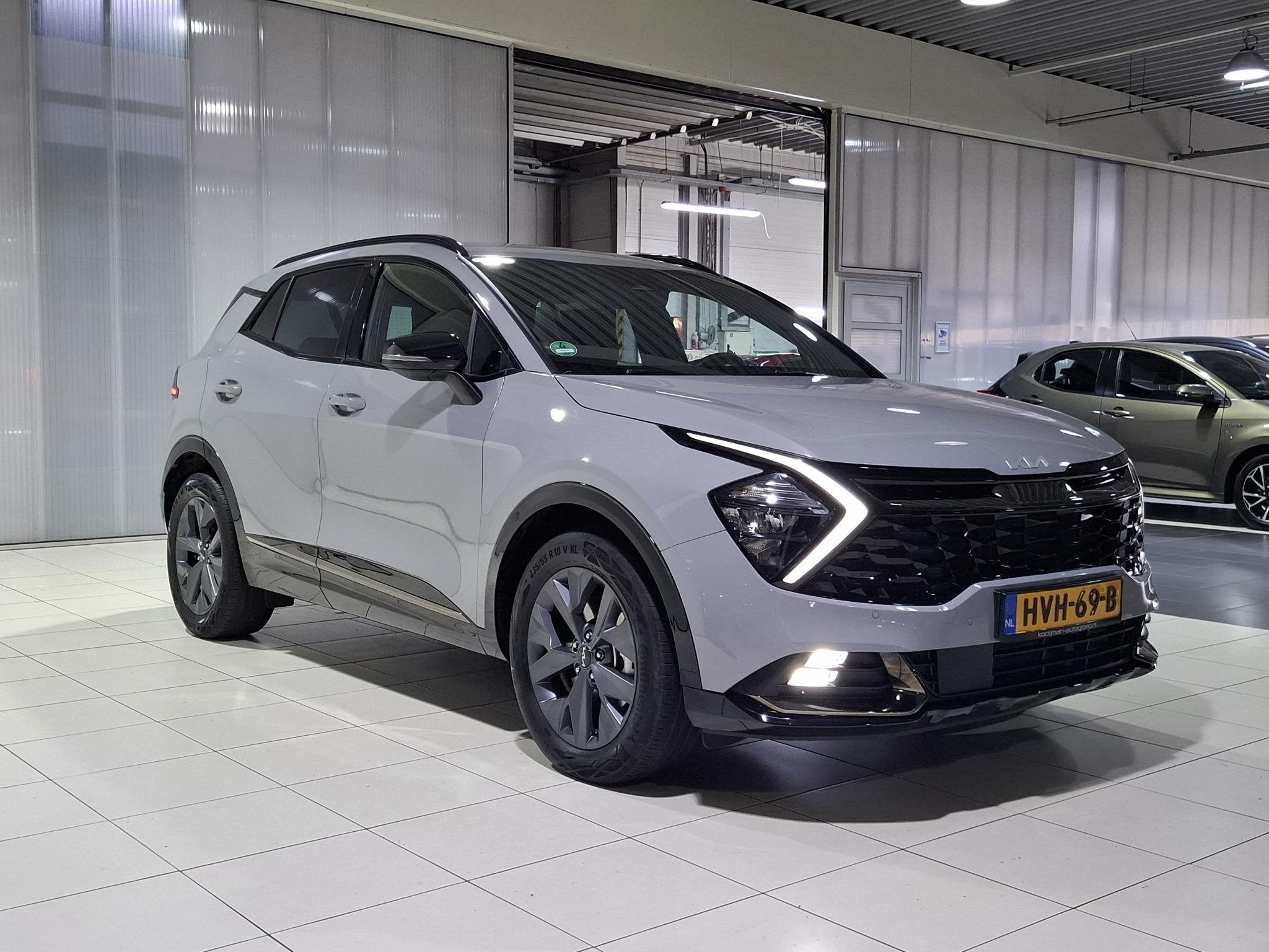Kia Sportage 1.6 T-GDi Hybrid Dark Edition Stoel en verwarmi, Auto's, Verwarmde buitenspiegels, Gebruikt, Euro 6, 4 cilinders