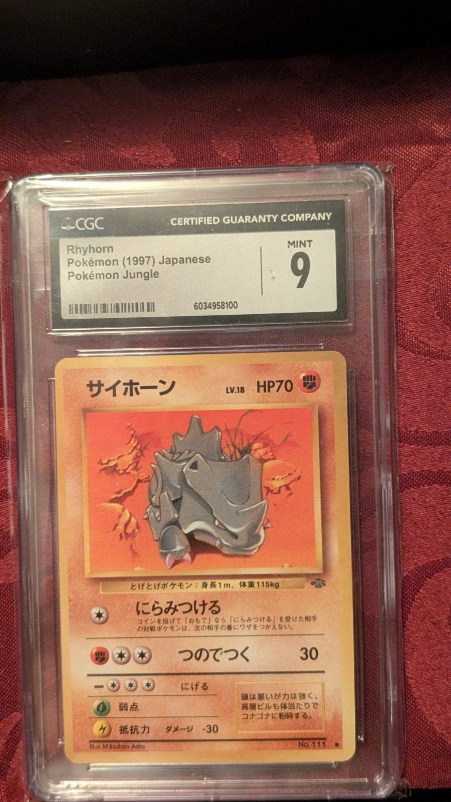 Rhyhorn Pokémon (1997) Japanese Jungle CGC Mint 9, Ophalen of Verzenden, Zo goed als nieuw, Losse kaart