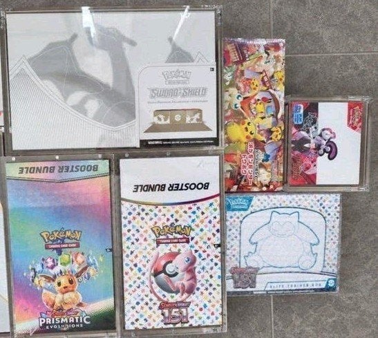 Sealed POKEMON collectie (151, prismatic, charizard), Ophalen, Nieuw