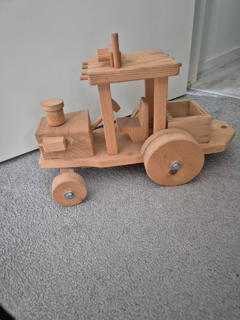 Houten traktor, Ophalen, Gebruikt