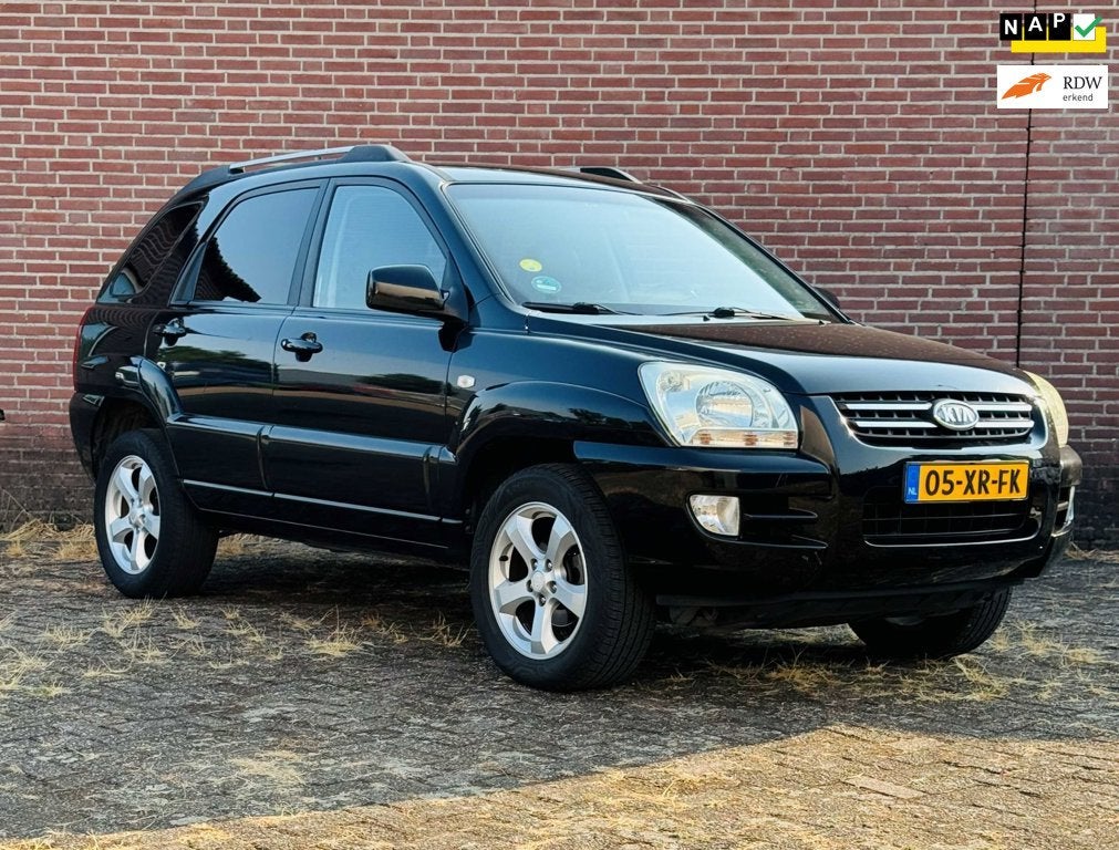 Kia Sportage 2.0 CVVT Comfort, Auto's, 1442 kg, Gebruikt, Zwart, 4 cilinders