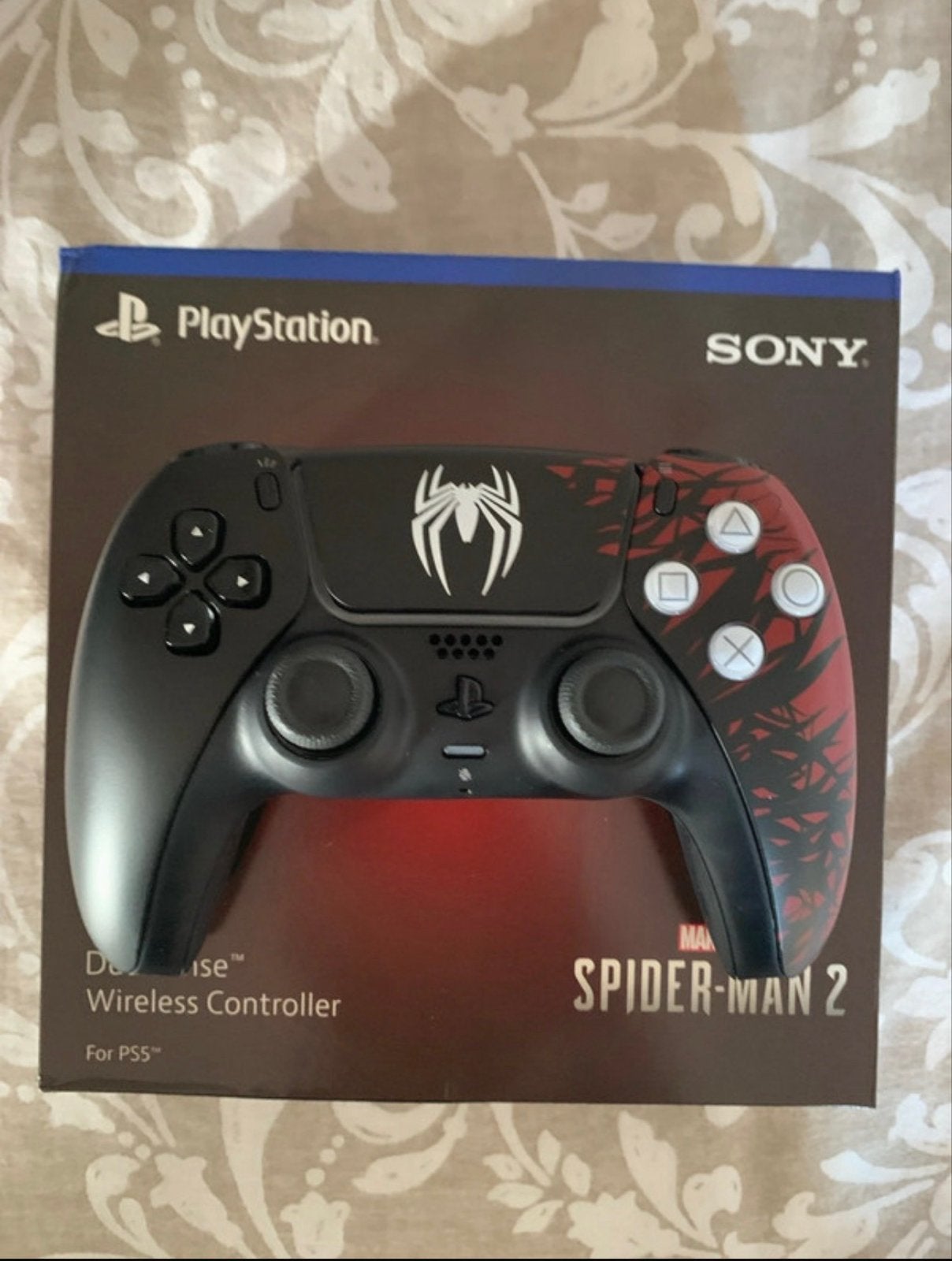 PS5 Wireless Controller - Spider-Man 2 Editie, PlayStation 5, Ophalen of Verzenden, Zo goed als nieuw, Controller