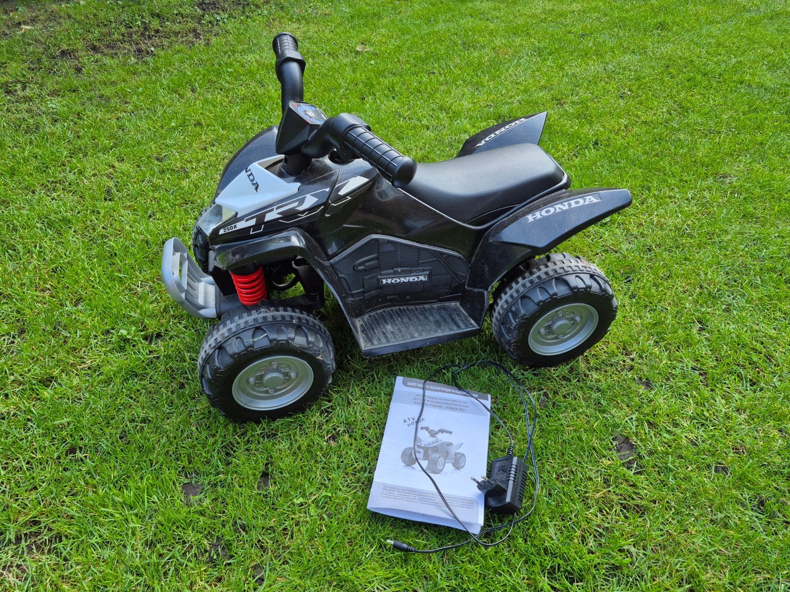 Honda elektrische kinderquad met oplaadkabel, Gebruikt