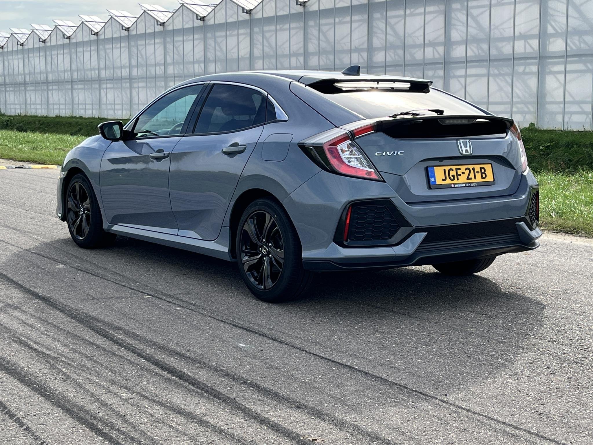 Honda Civic 1.0 i-VTEC Elegance, Auto's, Voorwielaandrijving, Automatische klimaatregeling, Stof, Gebruikt
