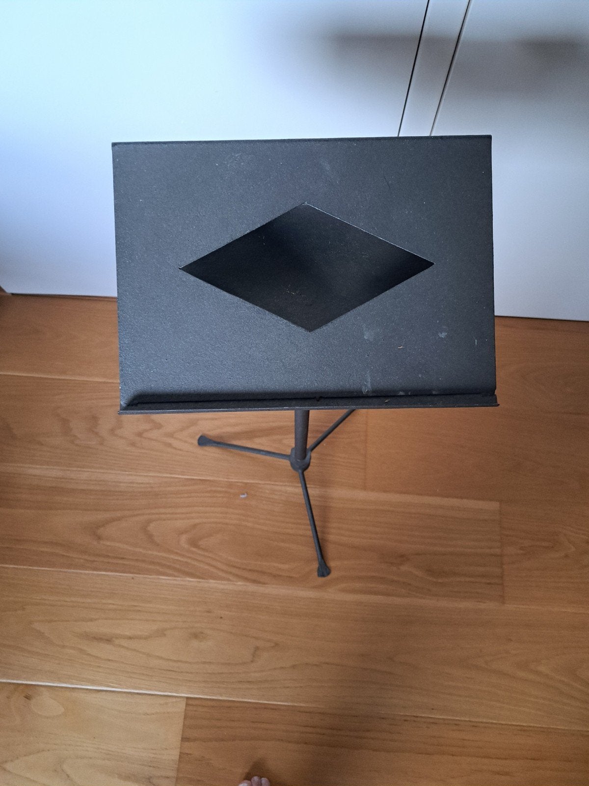 Metalen boekensteun, Ophalen