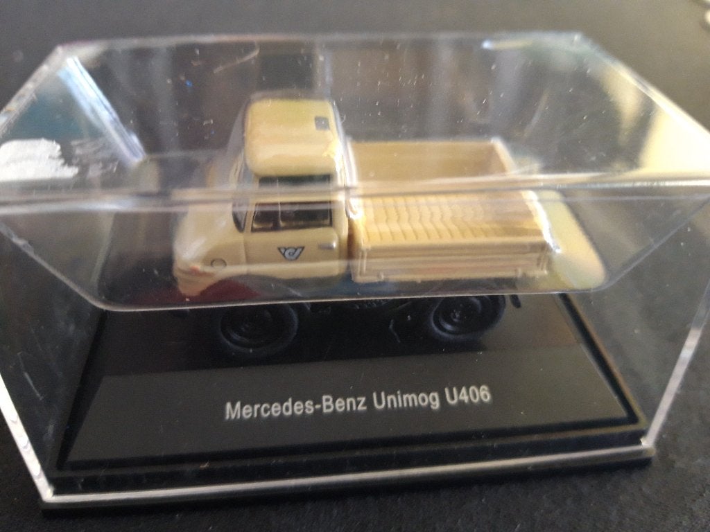 Unimog U 406 beige – Schuco 1:87 diecast - metaal, Ophalen of Verzenden, Zo goed als nieuw, Bus of Vrachtwagen, Schuco