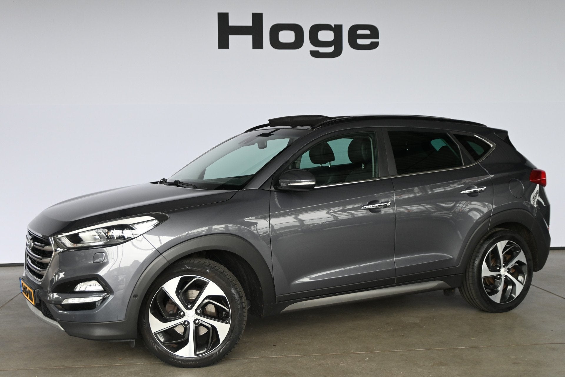 Hyundai Tucson 1.6 T-GDi Comfort 4WD Automaat Cruise Clima T, Auto's, Gebruikt, 4 cilinders, Met garantie (alle), Leder