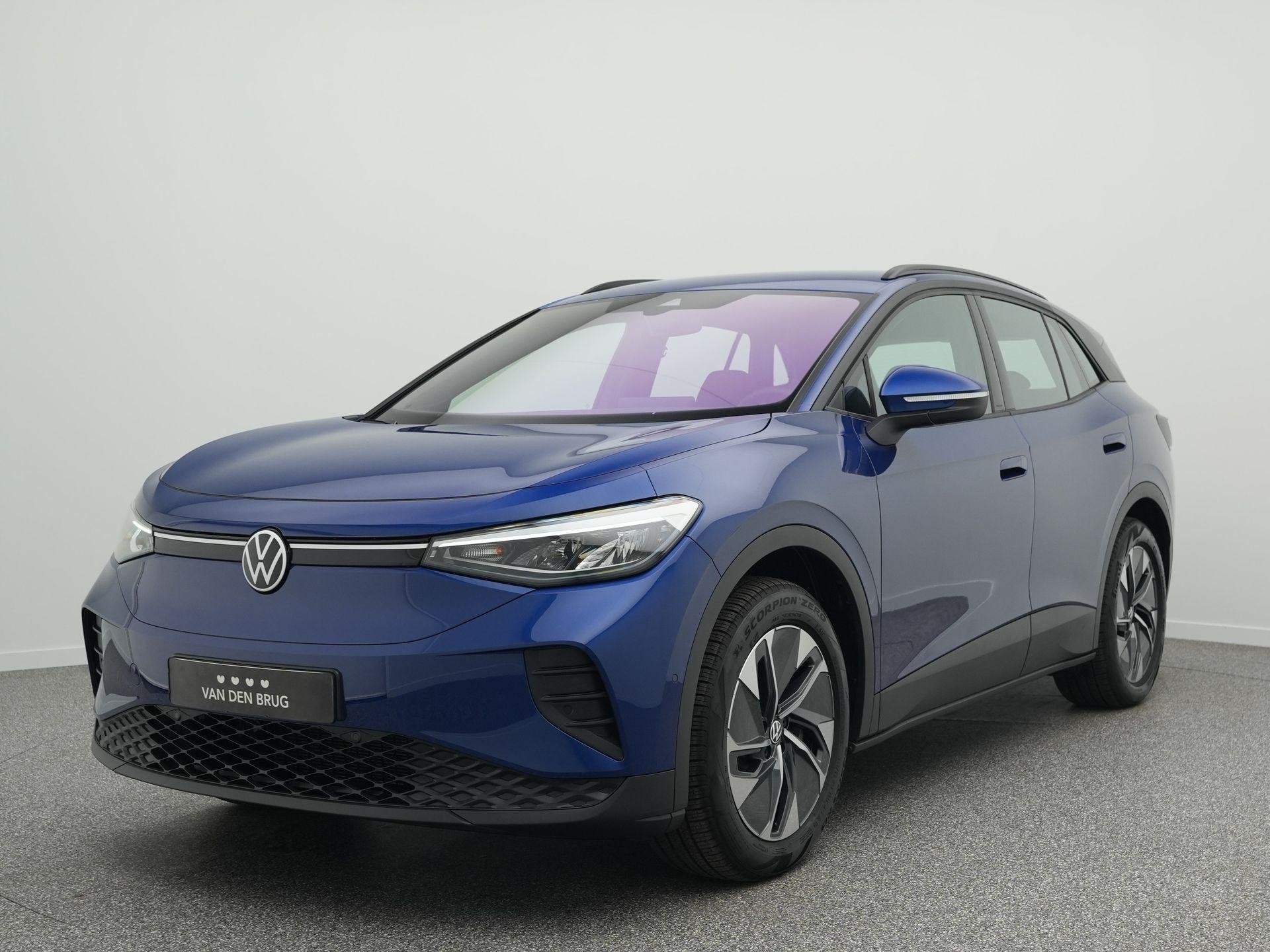 Volkswagen ID.4 Pro Business 77 kWh | Warmtepomp | Zwenkbare, Auto's, Automaat, Achterwielaandrijving, Gebruikt, Blauw