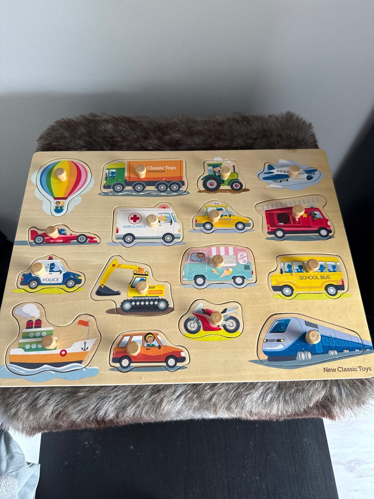 Houten puzzel met voertuigen - New Classic Toys, Ophalen, Zo goed als nieuw