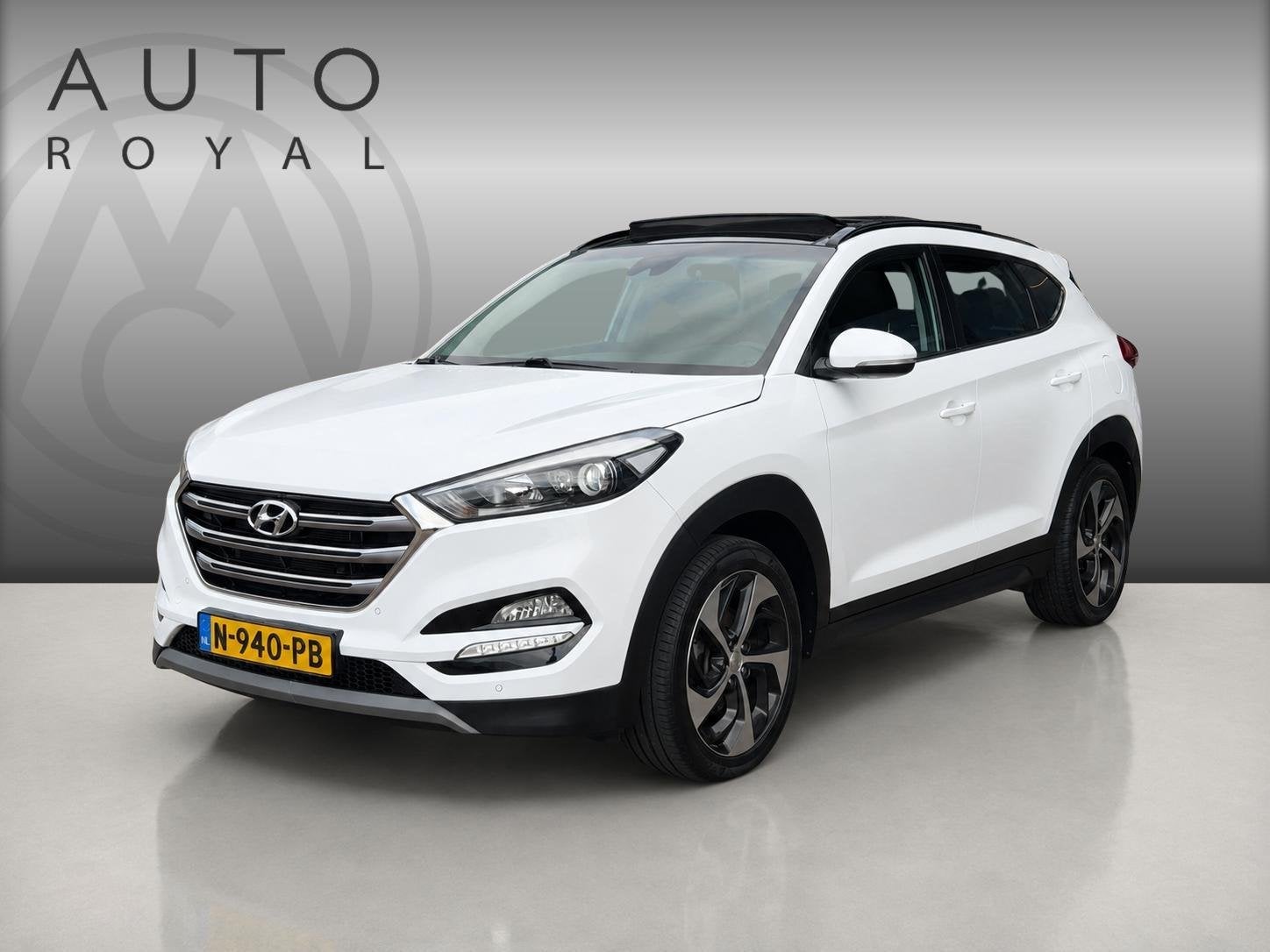 Hyundai Tucson 1.6 T-GDi Comfort PANORAMADAK | CAMERA | TREK, Auto's, Stof, Gebruikt, 4 cilinders, Wit