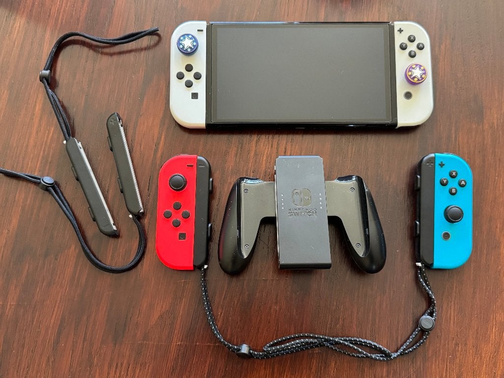 Nintendo Switch OLED White + Extra Joy-Cons + Tomtoc Case, Spelcomputers en Games, Spelcomputers | Nintendo Switch, Ophalen of Verzenden