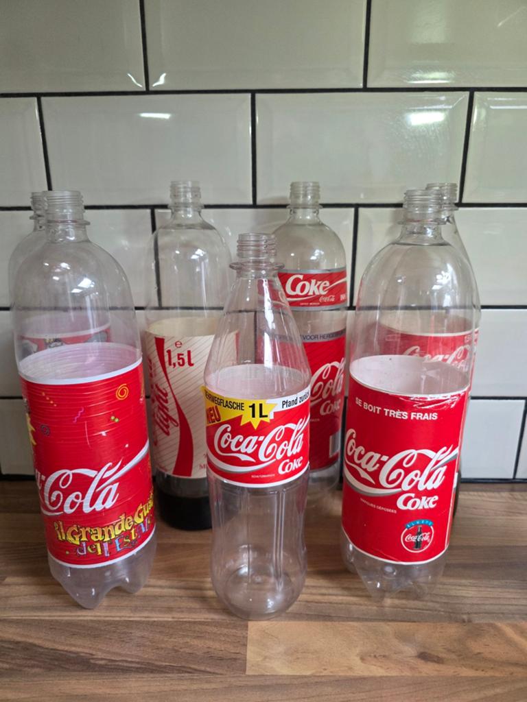 7 Vintage Coca-Cola flessen - Diverse maten en designs, Ophalen of Verzenden, Gebruikt