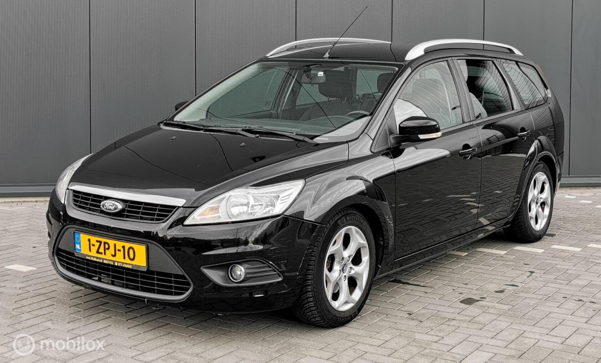 Ford Focus Wagon 1.6 Ghia 101PK/AIRCO/ELEKTR/CV/CRUISE/MTF/, Auto's, 1596 cc, Zwart, 635 kg, Zwart