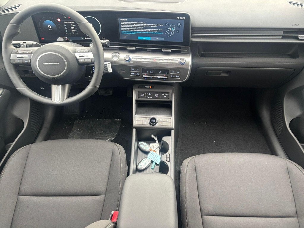 Hyundai Kona Electric Pure Edition 64.8 kWh / €1500,- Voor, Auto's, Hyundai, Stof, 750 kg, Blauw, 420 min