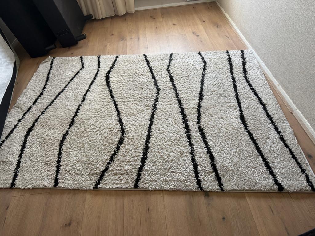 FRAAI Vloerkleed Grand Wire Zwart/Crème 160x230cm, Huis en Inrichting, Stoffering | Tapijten en Kleden, Ophalen, Gebruikt, Zwart