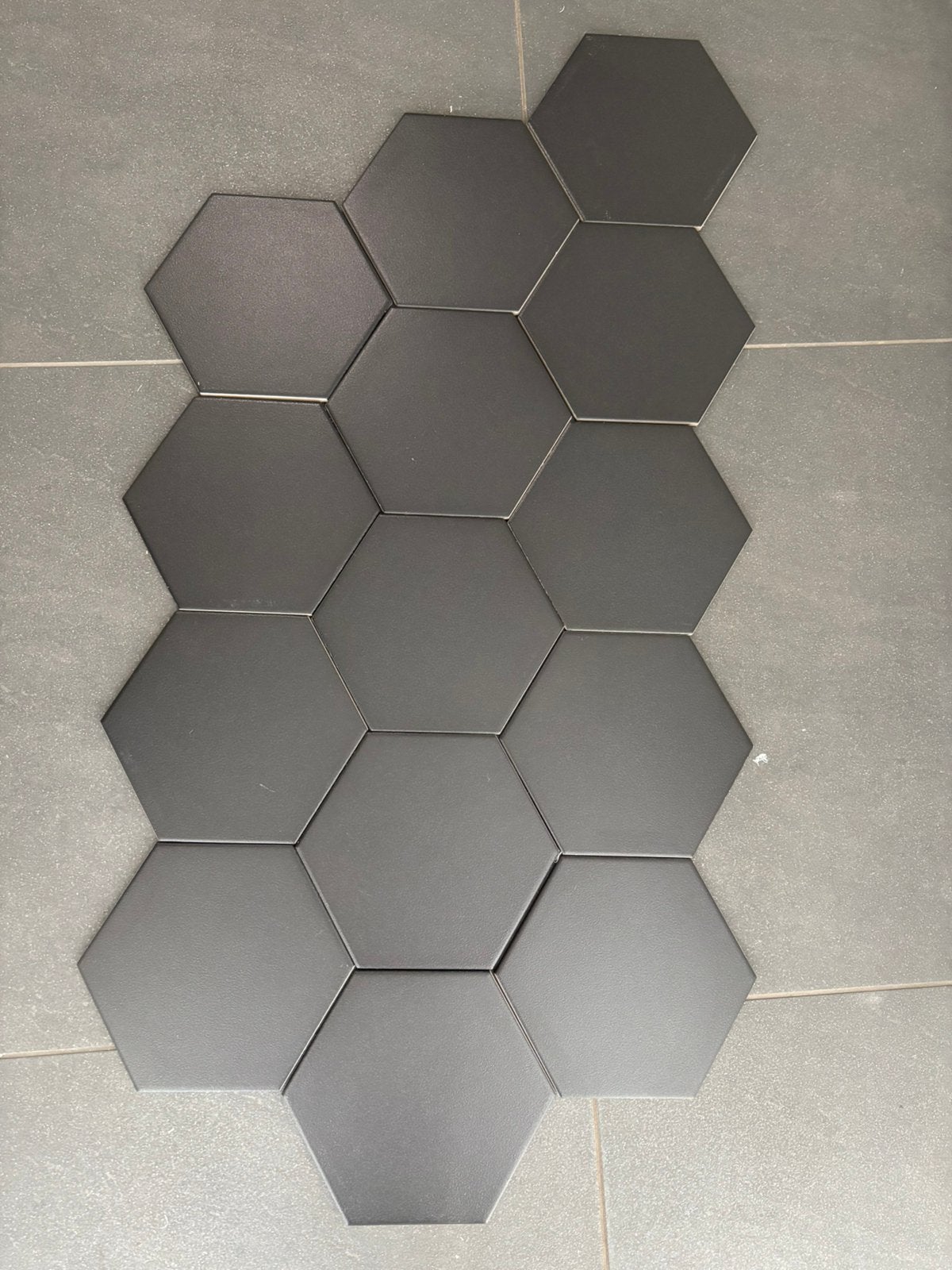 Zeshoekige zwarte tegels, Doe-het-zelf en Verbouw, Ophalen, 60 cm of meer, 40 tot 60 cm, Keramiek