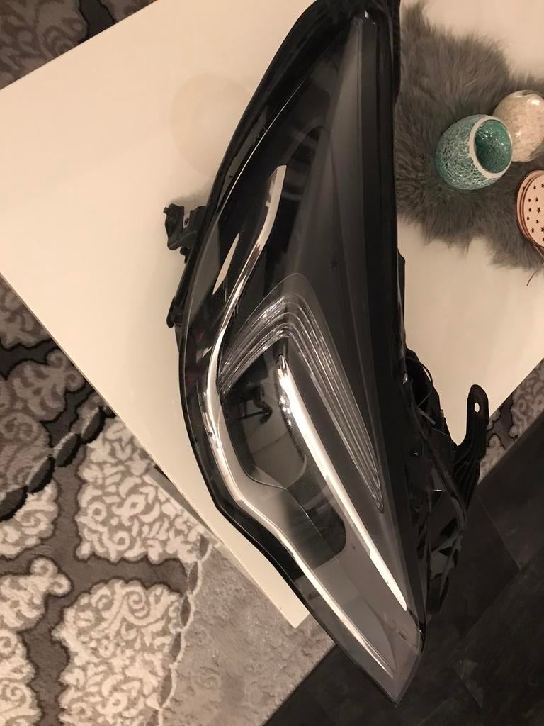 Koplamp van opel astra, Ophalen, Opel