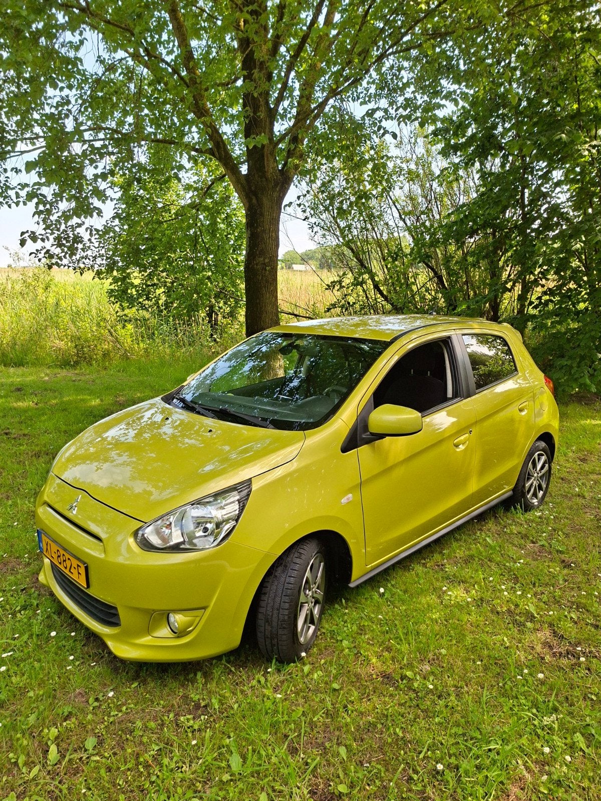 Mitsubishi Space Star 1.2 MPI 59KW 2015 Geel in NIEUWSTAAT., Auto's, Voorwielaandrijving, 200 kg, Geel, 24 km/l