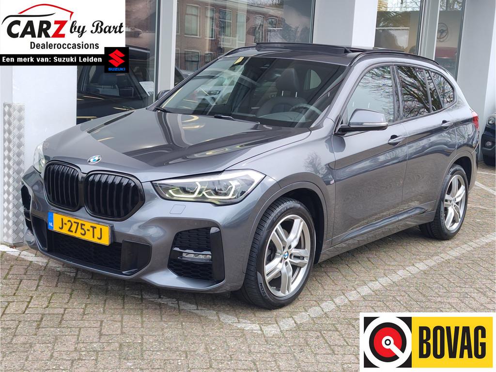 BMW X1 SDRIVE18i HIGH EXECUTIVE AUT. Open dak | Alarmsysteem, 12 maanden, Gebruikt, Leder, 19 km/l