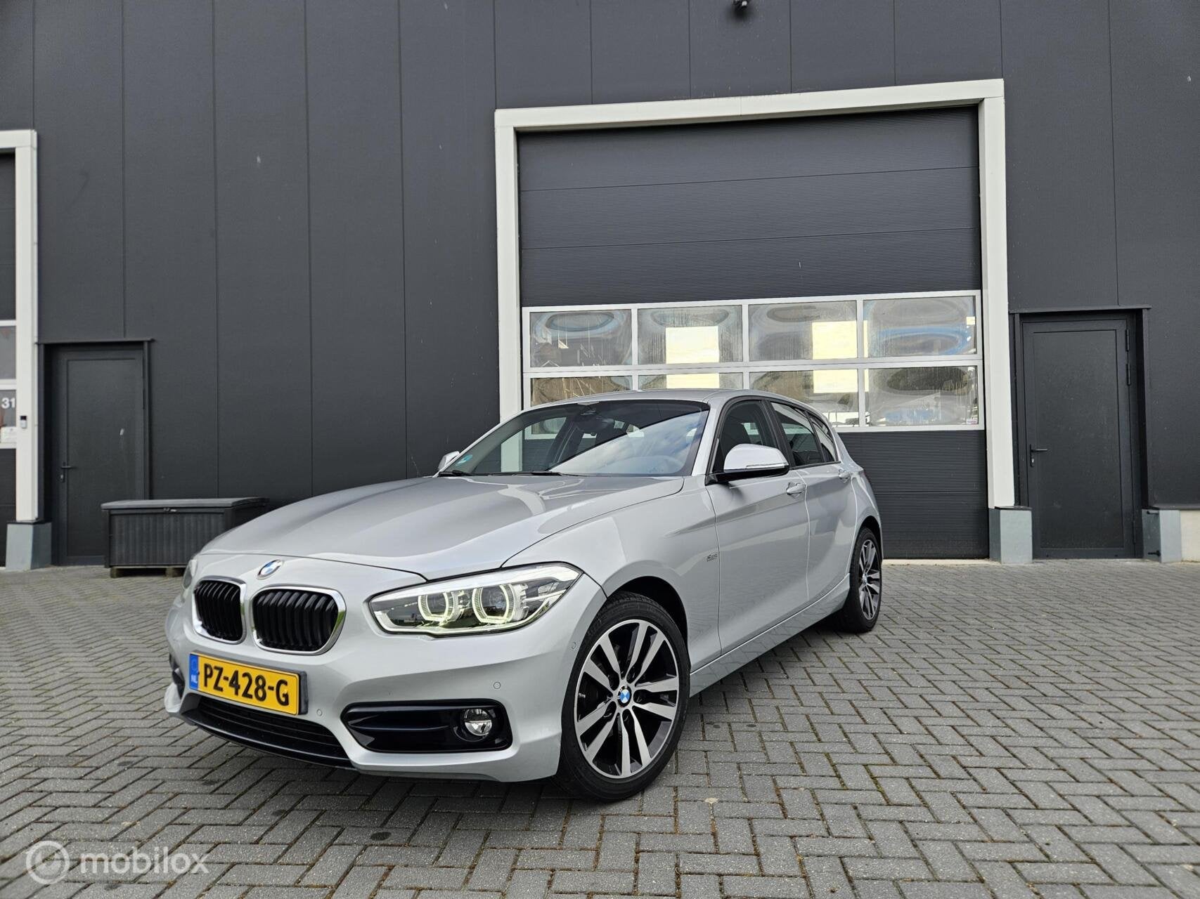 BMW 1 Serie 120i Sportline | 24.538 KM! | 1e Eig. | NL | LED, Auto's, Gebruikt, 4 cilinders, Origineel Nederlands, Parkeerassistent