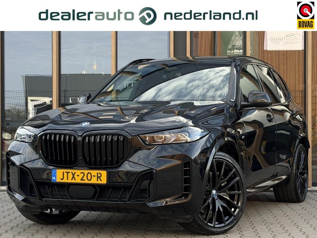 BMW X5 xDrive 50e M-Sport | Panoramadak |Driving Assistant |, Gebruikt, 2395 kg, Zwart, Bedrijf