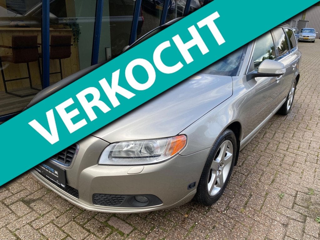 Volvo V70 3.2 Summum Automaat 238PK / LEER / XENON / TREKHAA, Auto's, 238 pk, Gebruikt, Zwart, Automatische klimaatregeling