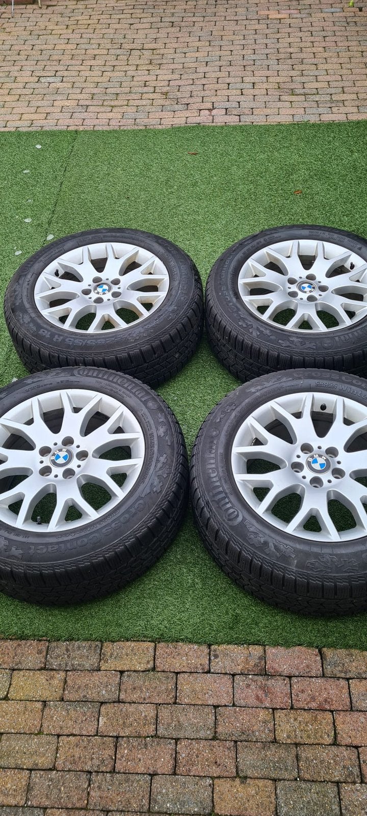 Set van 4 gebruikte 18 inch BMW velgen met Continental, Ophalen