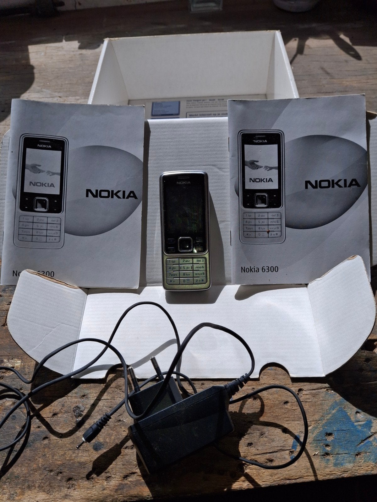 Nokia 6300 inclusief oplader - In prima werkende staat, Ophalen of Verzenden