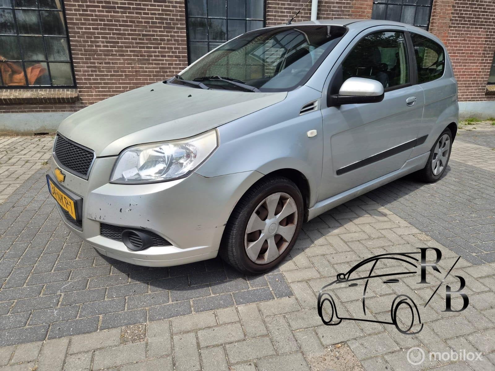 Chevrolet Aveo 1.2 16V LS+ LPG AIRCO APK 2027, Auto's, Chevrolet, Voorwielaandrijving, Euro 5, Stof, Aveo