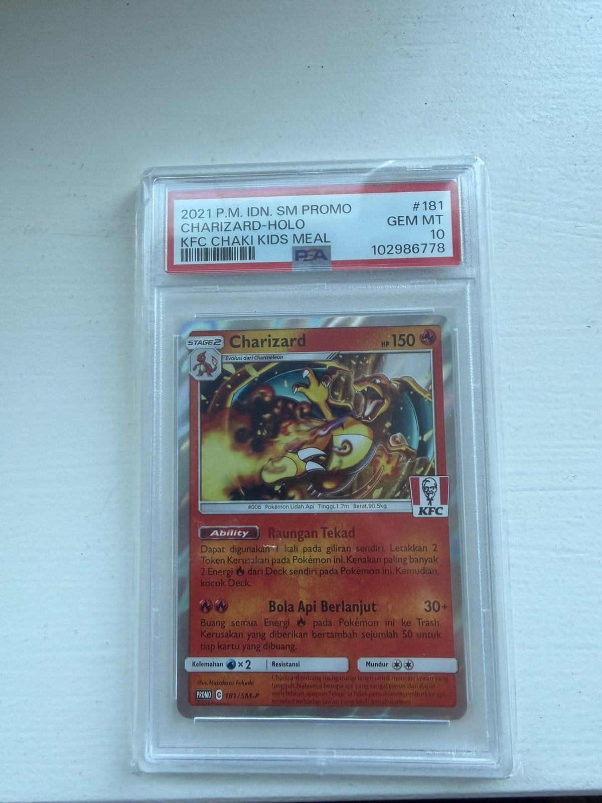 Charizard kfc psa 10, Hobby en Vrije tijd, Ophalen of Verzenden, Zo goed als nieuw