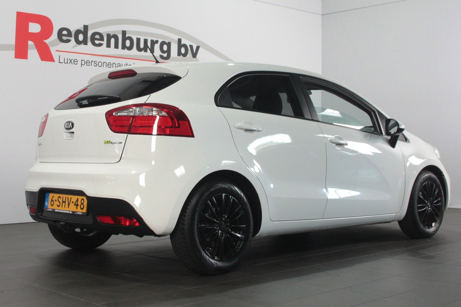 Kia Rio 1.2 CVVT Plus Pack - Airco / Radio cd / Stuurbed., Auto's, Euro 5, Gebruikt, 4 cilinders, Wit
