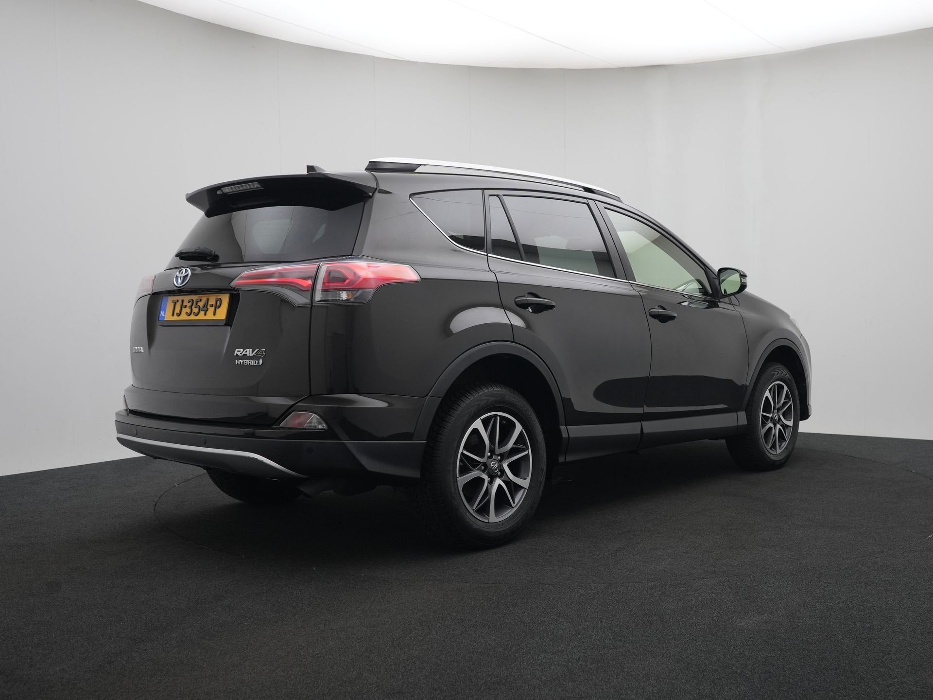 Toyota RAV4 2.5 Hybrid Executive Business (bj 2016), 12 maanden, Gebruikt, Zwart, Bedrijf