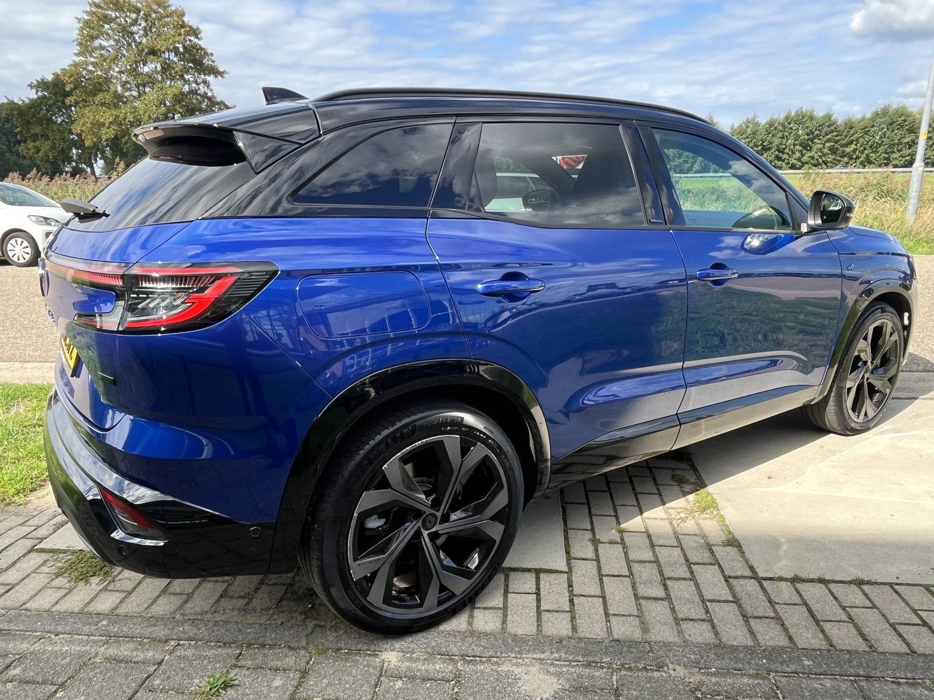 Renault Austral 1.2 E-Tech full hybrid 200PK iconic esprit A, Auto's, Gebruikt, 1199 cc, Blauw, Bedrijf
