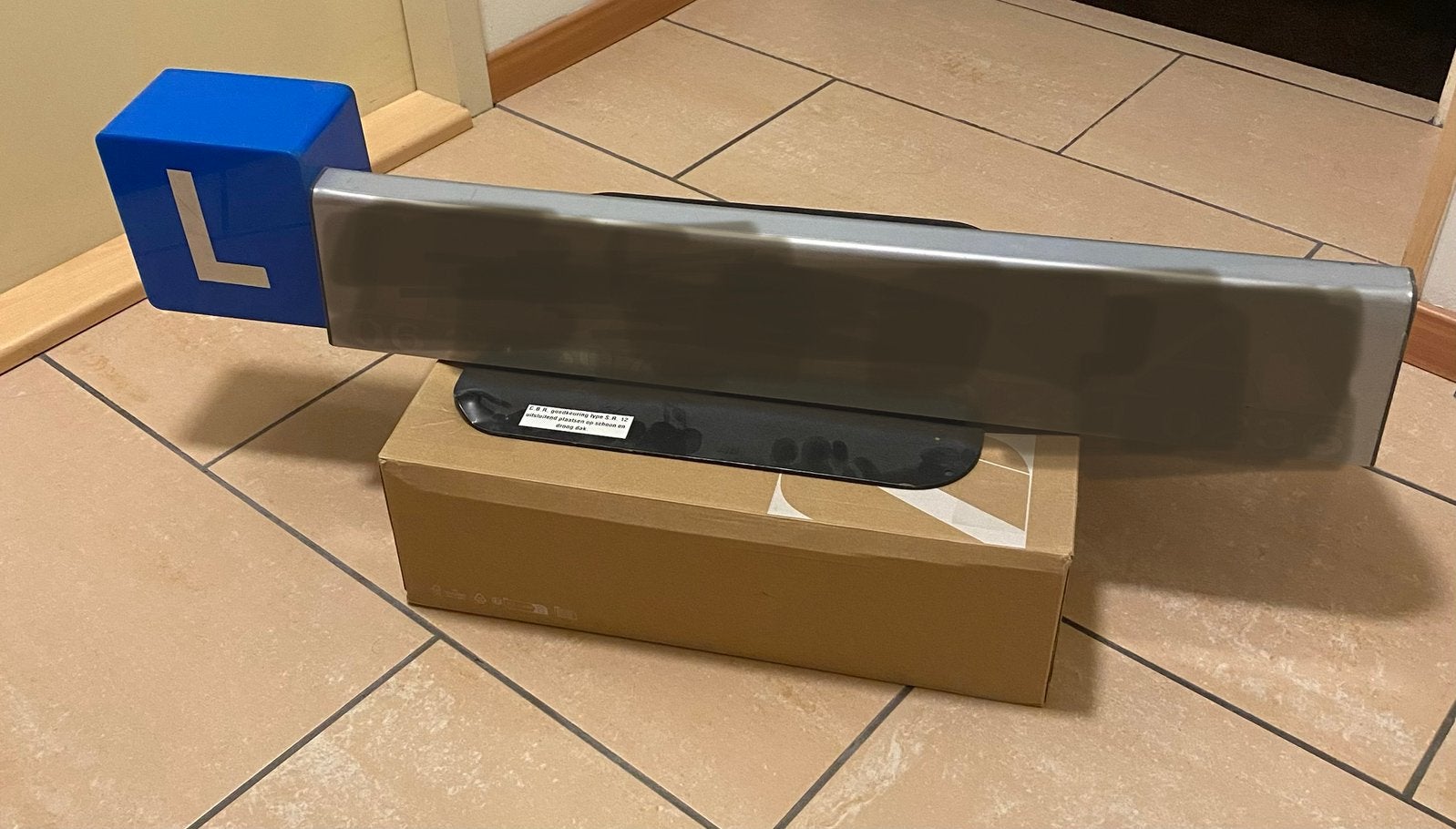 Daknaambord lesauto Cbr goedgekeurd, Ophalen