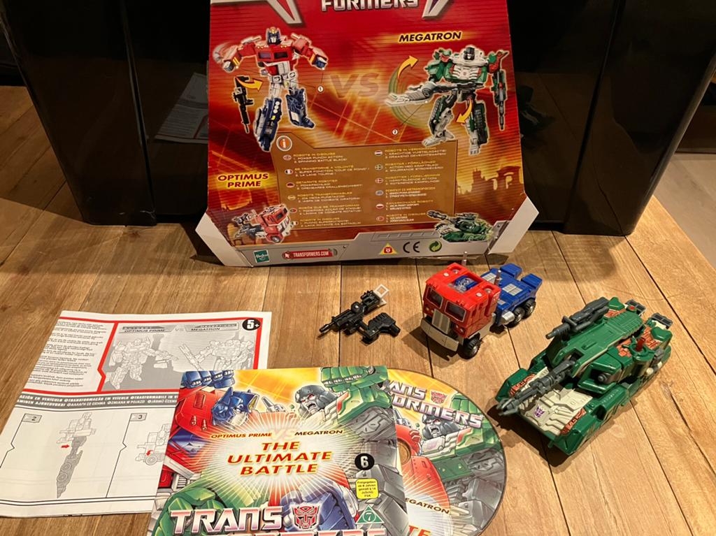 Transformers rid classics optimus prime en megstron, Verzamelen, Transformers, Overige generaties, Ophalen of Verzenden, Zo goed als nieuw