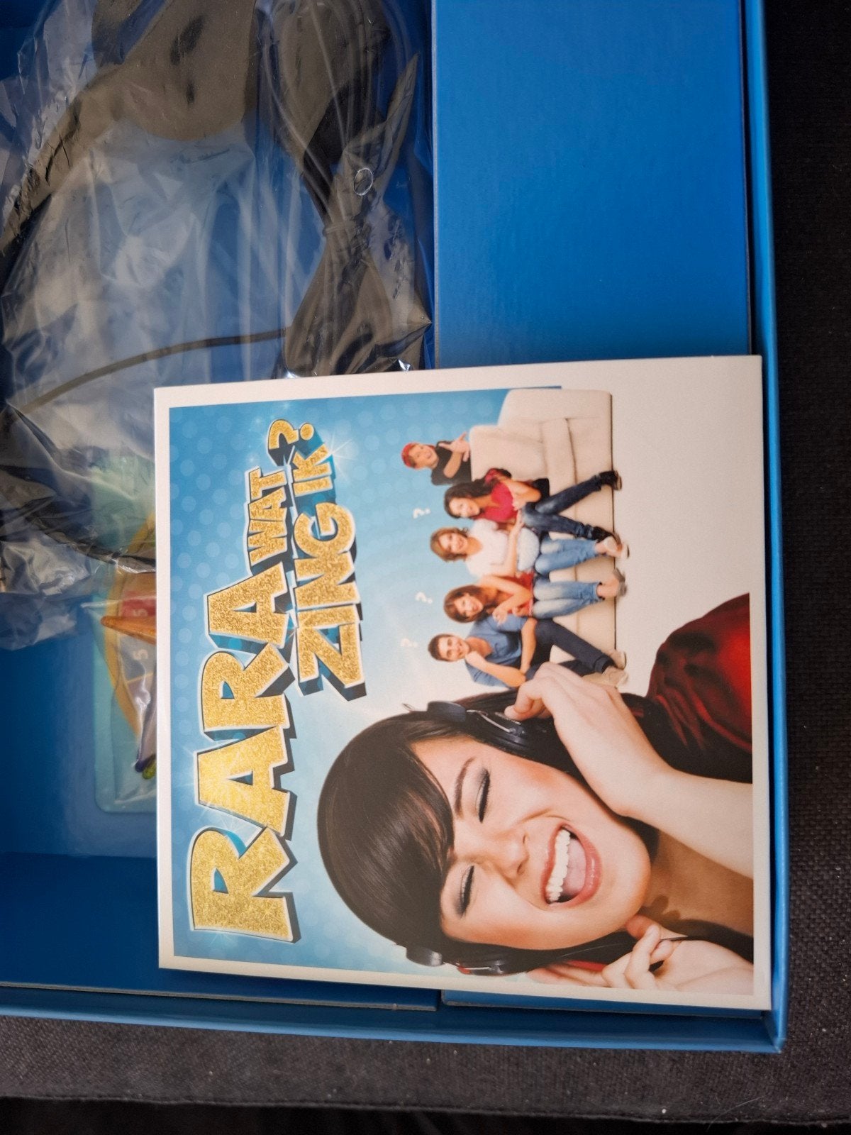 Rara, wat zing ik? - Karaoke spel met koptelefoon, Alle leeftijden, Ophalen of Verzenden, Zo goed als nieuw
