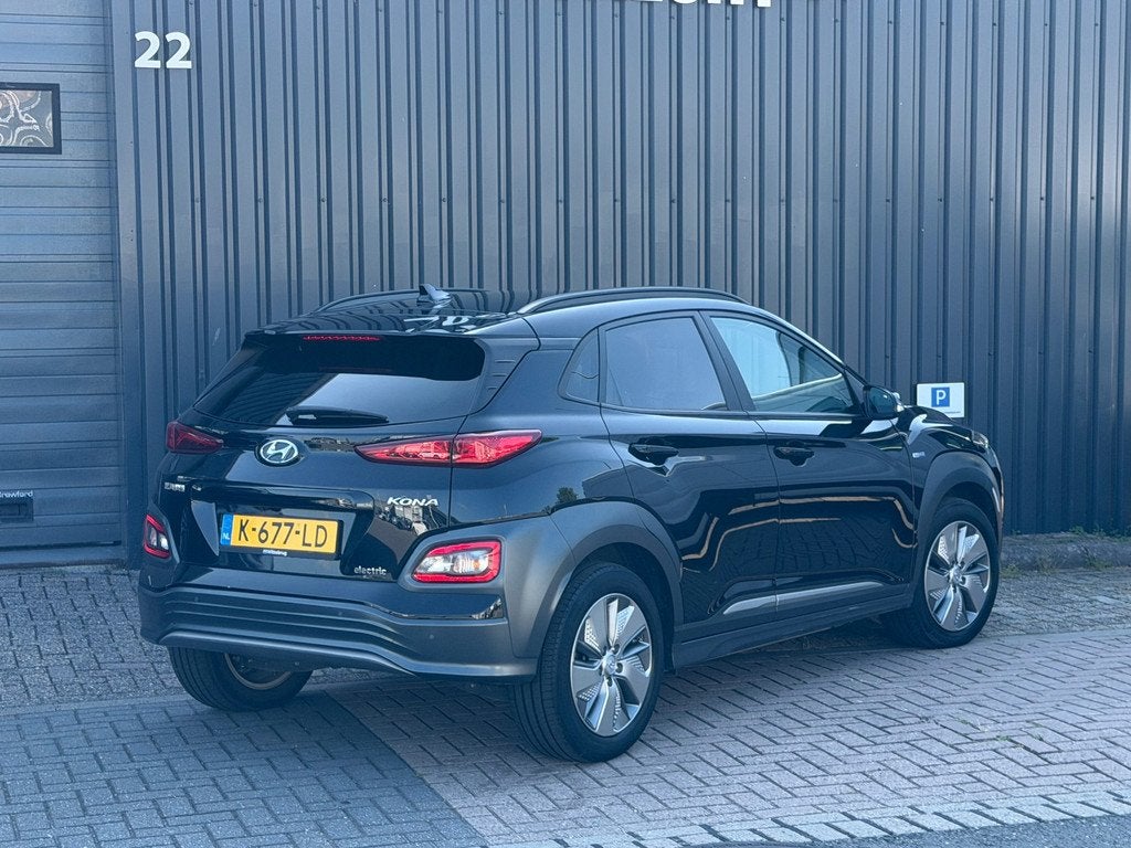 Hyundai Kona EV Limited 64 kWh|Fase 3|95% Soh|Cam|Leder|Head, Auto's, Hyundai, Gebruikt, 174 min, Zwart, 1066 min