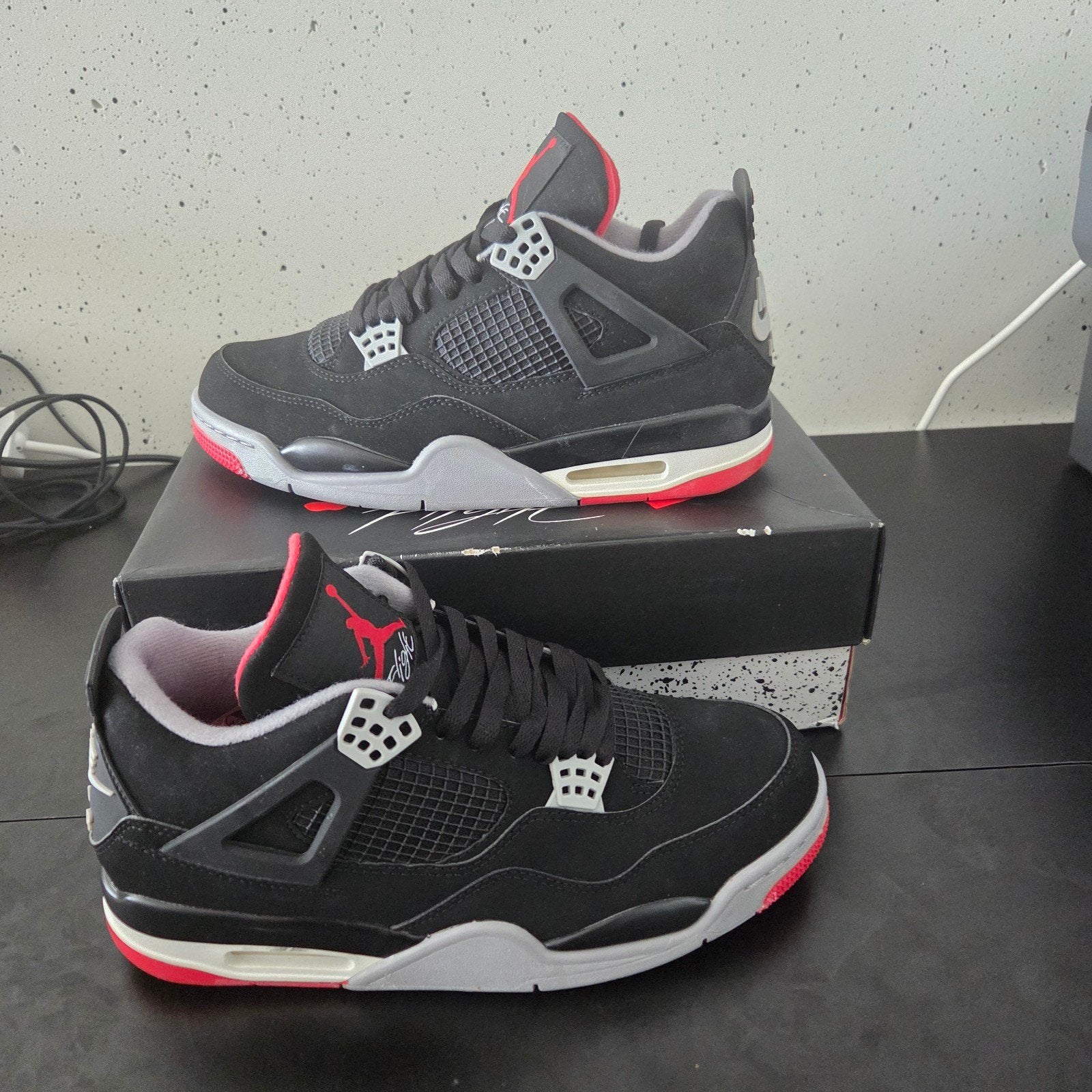 Nike Air Jordan 4 Retro Black/Fire Red - Maat 44.5, Zwart, Nieuw, Ophalen of Verzenden, Sneakers of Gympen