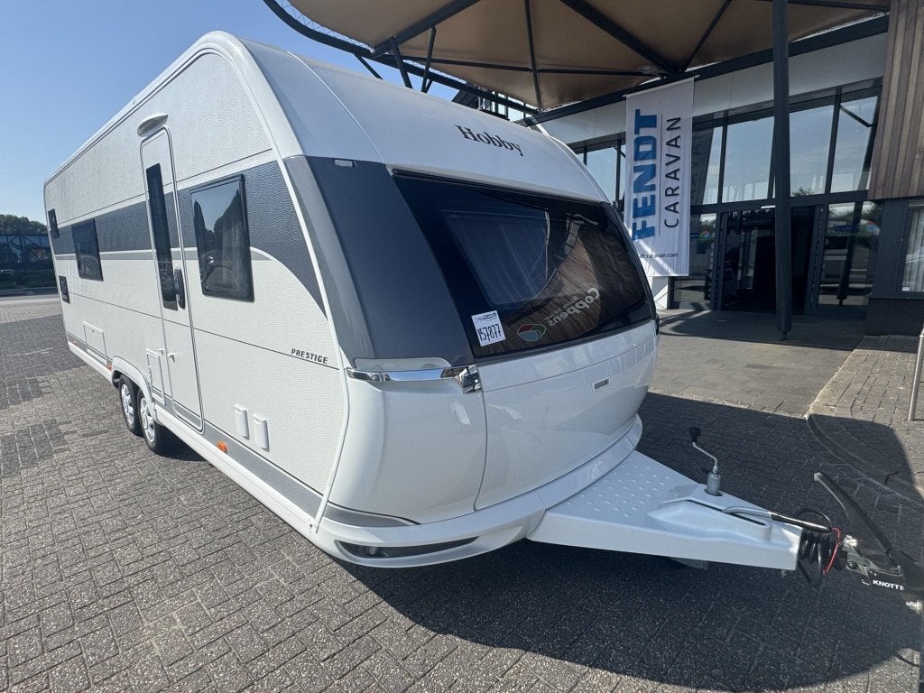Hobby Prestige 650 KFU NIEUW SUPERACTIE !!!!, Caravans en Kamperen, Caravans, Schokbreker, Rondzit, Bedrijf, 6 tot 7 meter
