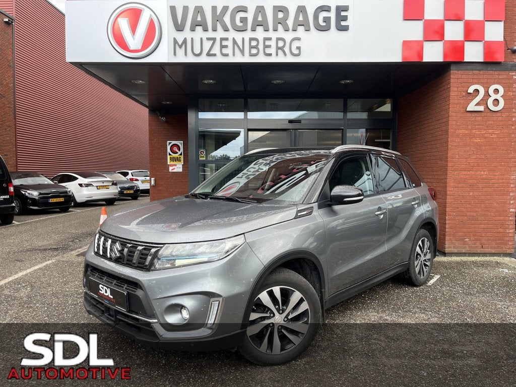 Suzuki Vitara 1.5 Hybrid Style AllGrip // SCHUIF-KANTELDAK /, Auto's, Suzuki, Automaat, Gebruikt, Zwart, 4 cilinders
