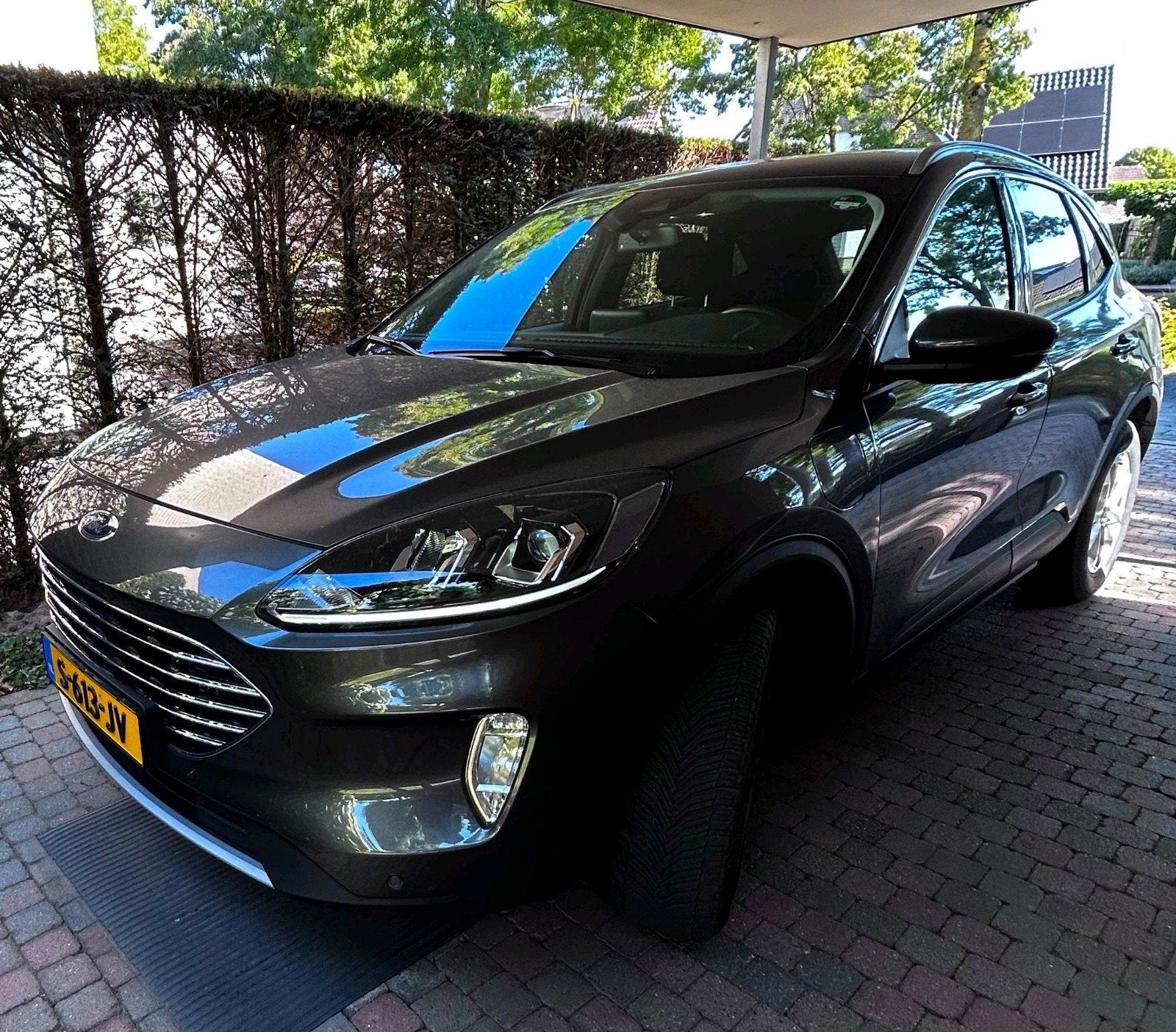 Ford Kuga 2.5 Phev E-cvt 225pk Titanium 2023 Grijs, Auto's, Stof, Parkeersensor, 4 cilinders, Dealer onderhouden