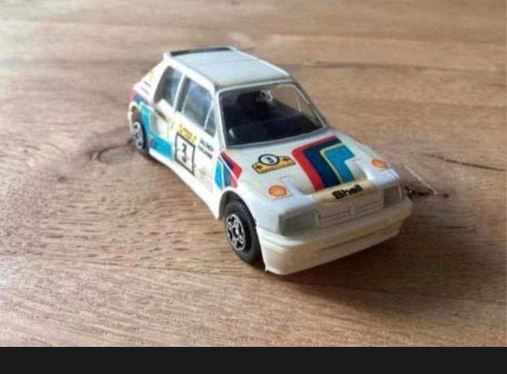 Peugeot 205 GTI Rally – Bburago (Made in Italy), Ophalen of Verzenden, Zo goed als nieuw, Auto, Overige merken