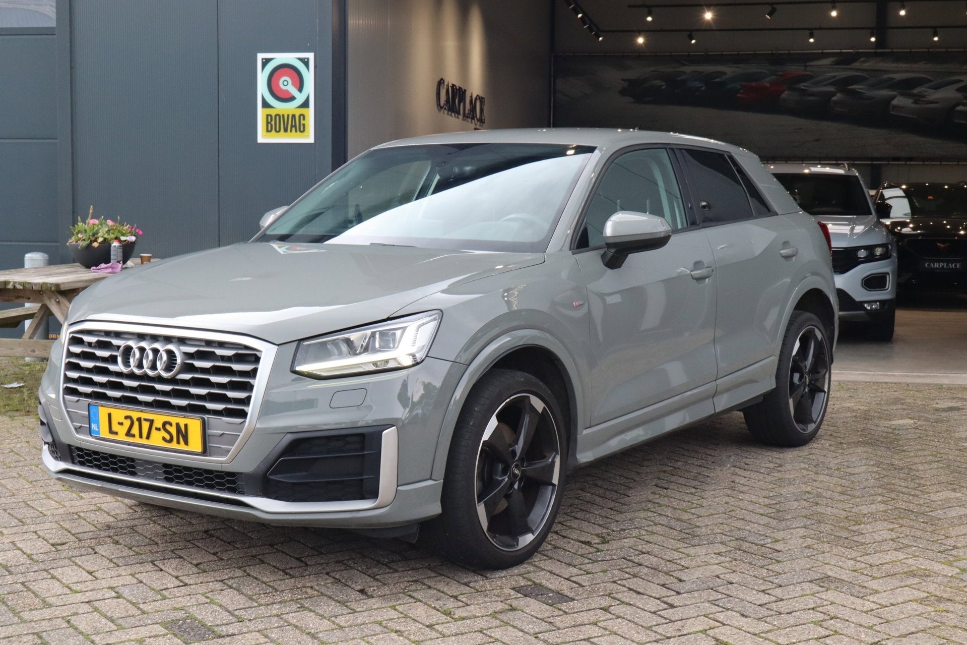 Audi Q2 35 TFSI S Edition-Automaat-Nardo grey, 15 km/l, 4 cilinders, 150 pk, Leder en Stof