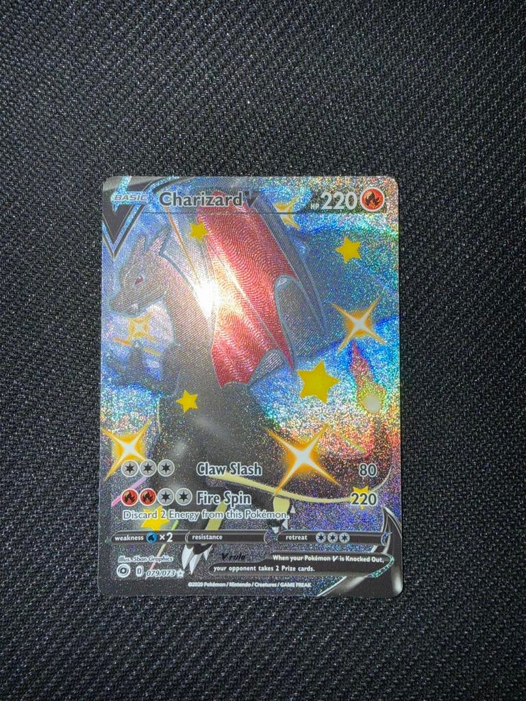 Pokemon charizard v 079/073, Ophalen of Verzenden, Zo goed als nieuw