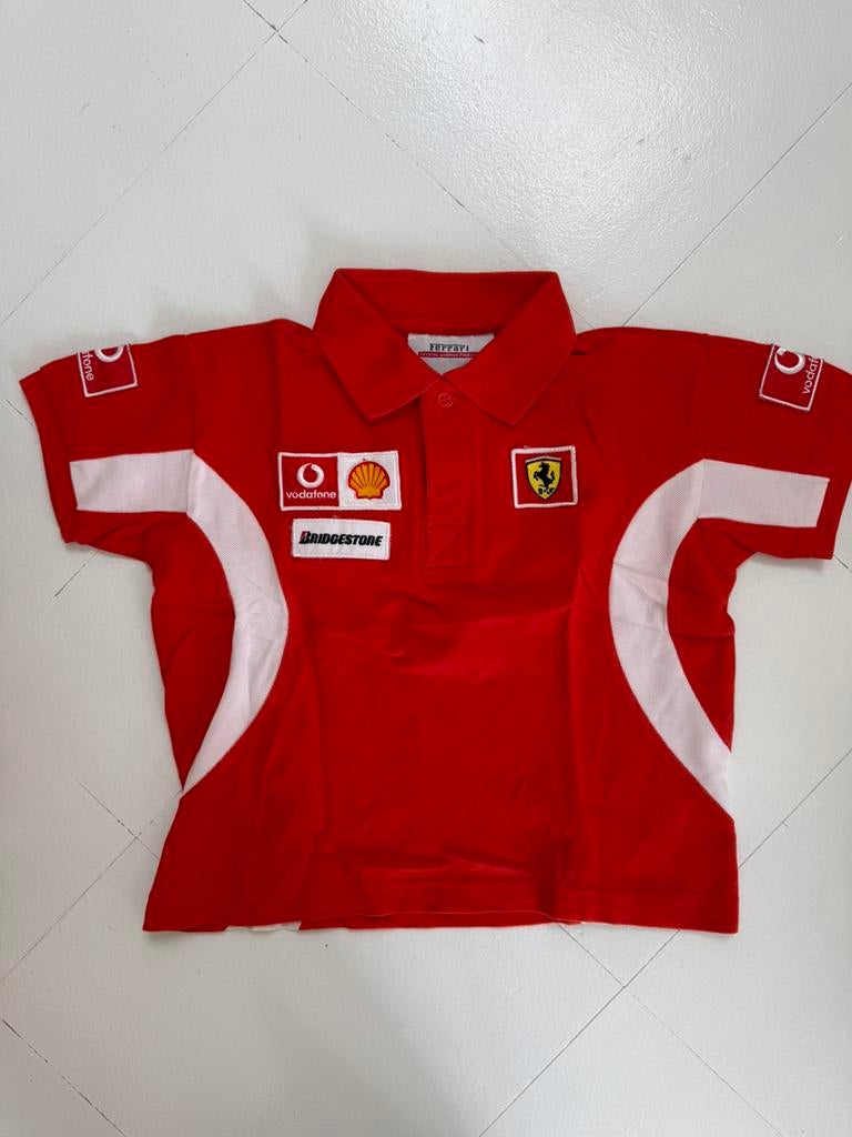 Oranje polo kind Ferrari. Merchandising F1, Ophalen of Verzenden, Jongen of Meisje, Shirt of Longsleeve