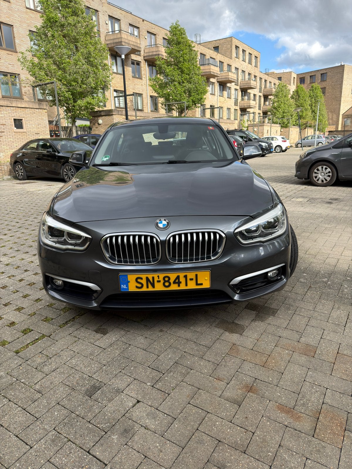 BMW 1-Serie 118i 136PK Aut 2018 Grijs, Auto's, Euro 5, 650 kg, Particulier, 3 cilinders