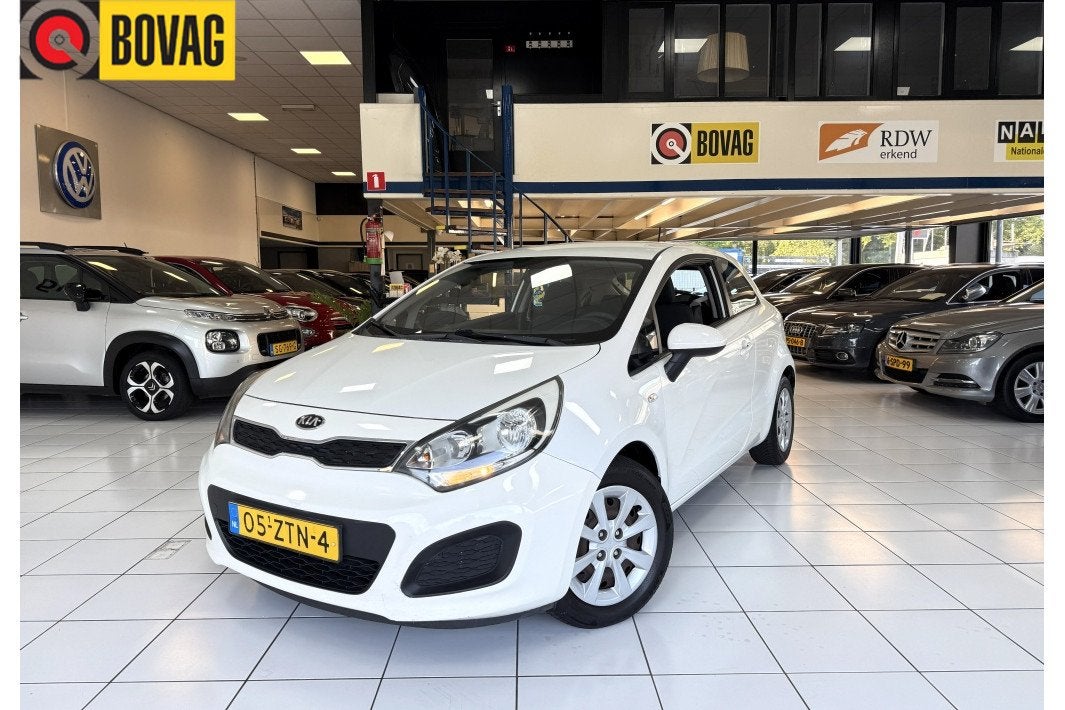 Kia Rio 1.2 CVVT Comf. Pack Bovag Garantie Airco (bj 2013), 21 km/l, Euro 5, 4 cilinders, Wit