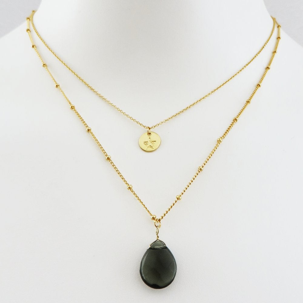 Dubbele ketting met grijze steen, Nieuw in verpakking, Nieuw, Ophalen of Verzenden, Goud, Overige materialen