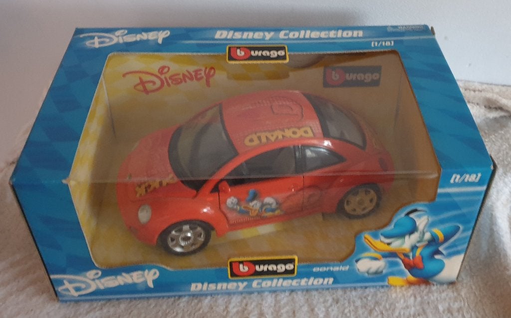 Disney Collection. Volkswagen beetle Donald Duck. zie foto's, Ophalen of Verzenden, Donald Duck, Zo goed als nieuw, Beeldje of Figuurtje