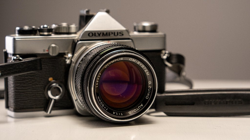 Olympus OM-1 + G.Zuiko Auto-S 50mm f/1.4, Audio, Tv en Foto, Ophalen of Verzenden, Gebruikt, Spiegelreflex, Olympus